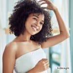 lady with healthy curly hair so does a handheld hair steamer really work?